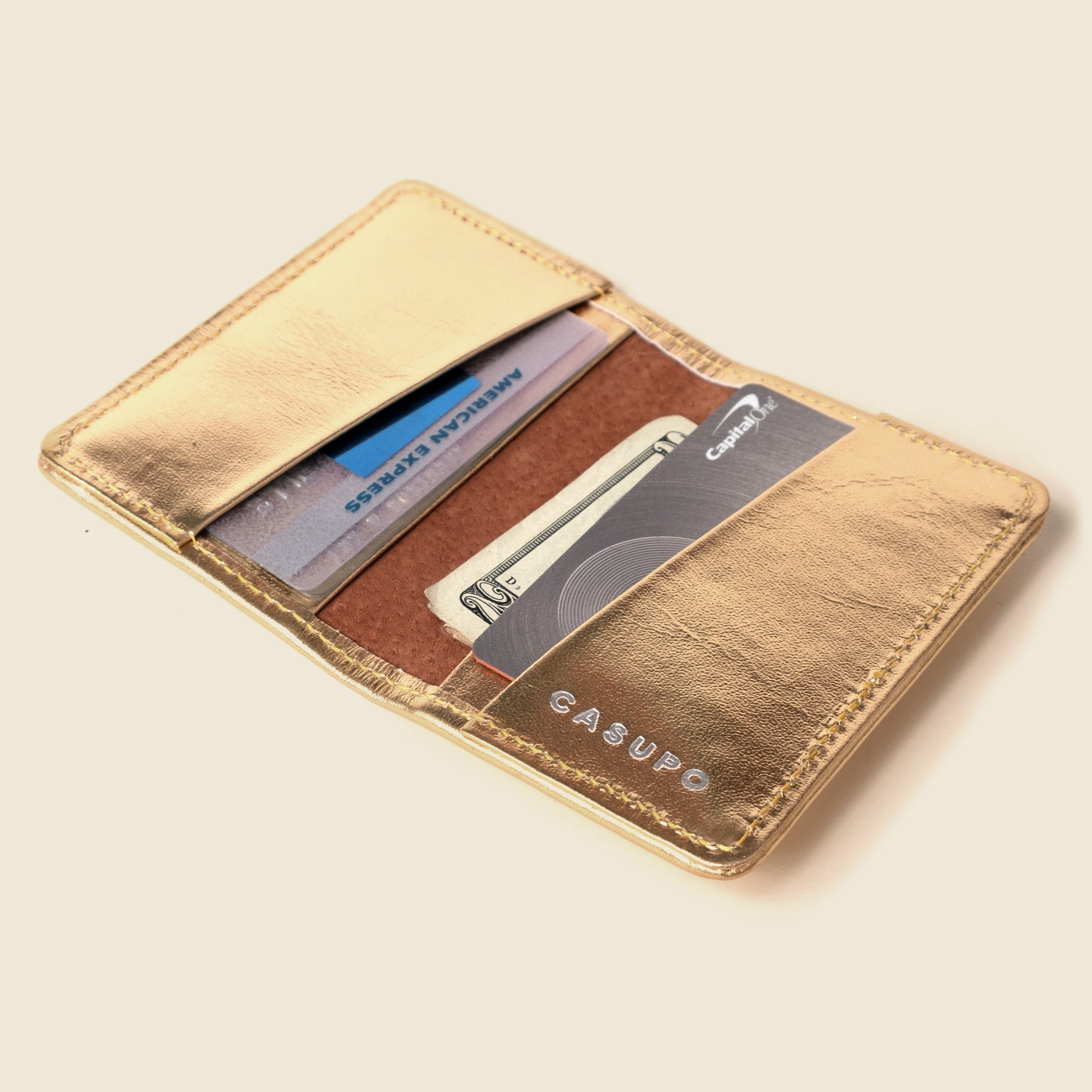 Cartera plegable compacta con protección RFID - Dorada