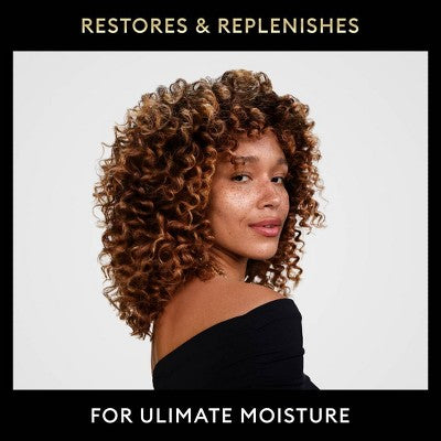 Champú hidratante Tresemmé Rich Moisture con dosificador para cabello seco, 1 litro y medio (envase imperfecto)