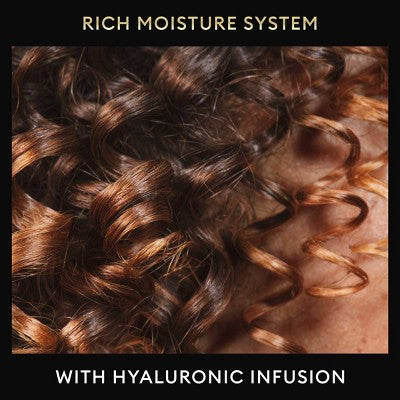 Champú hidratante Tresemmé Rich Moisture con dosificador para cabello seco, 1 litro y medio (envase imperfecto)