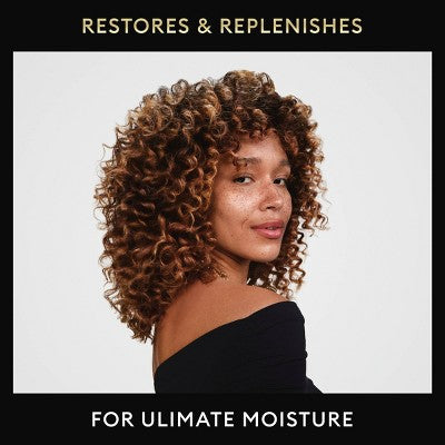 Champú hidratante Tresemmé Rich Moisture con dosificador para cabello seco, 1 litro y medio (envase imperfecto)